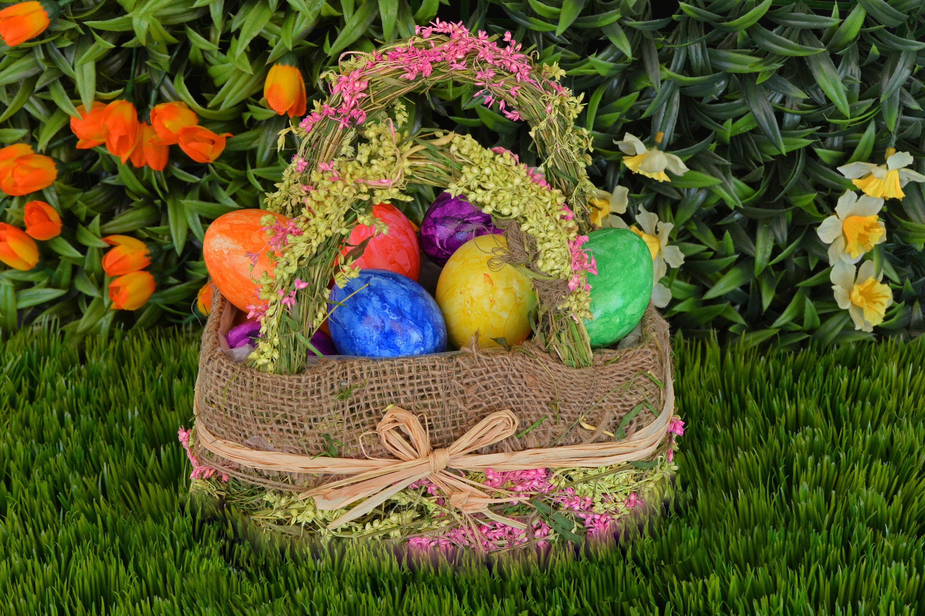easter eggs in brown floral basket