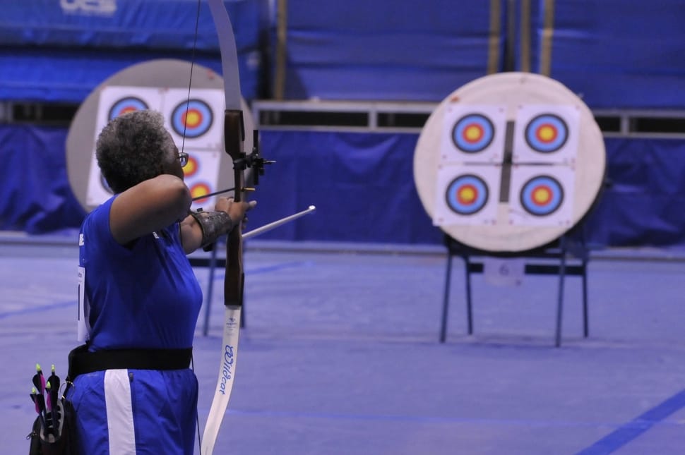 woman doing archery preview