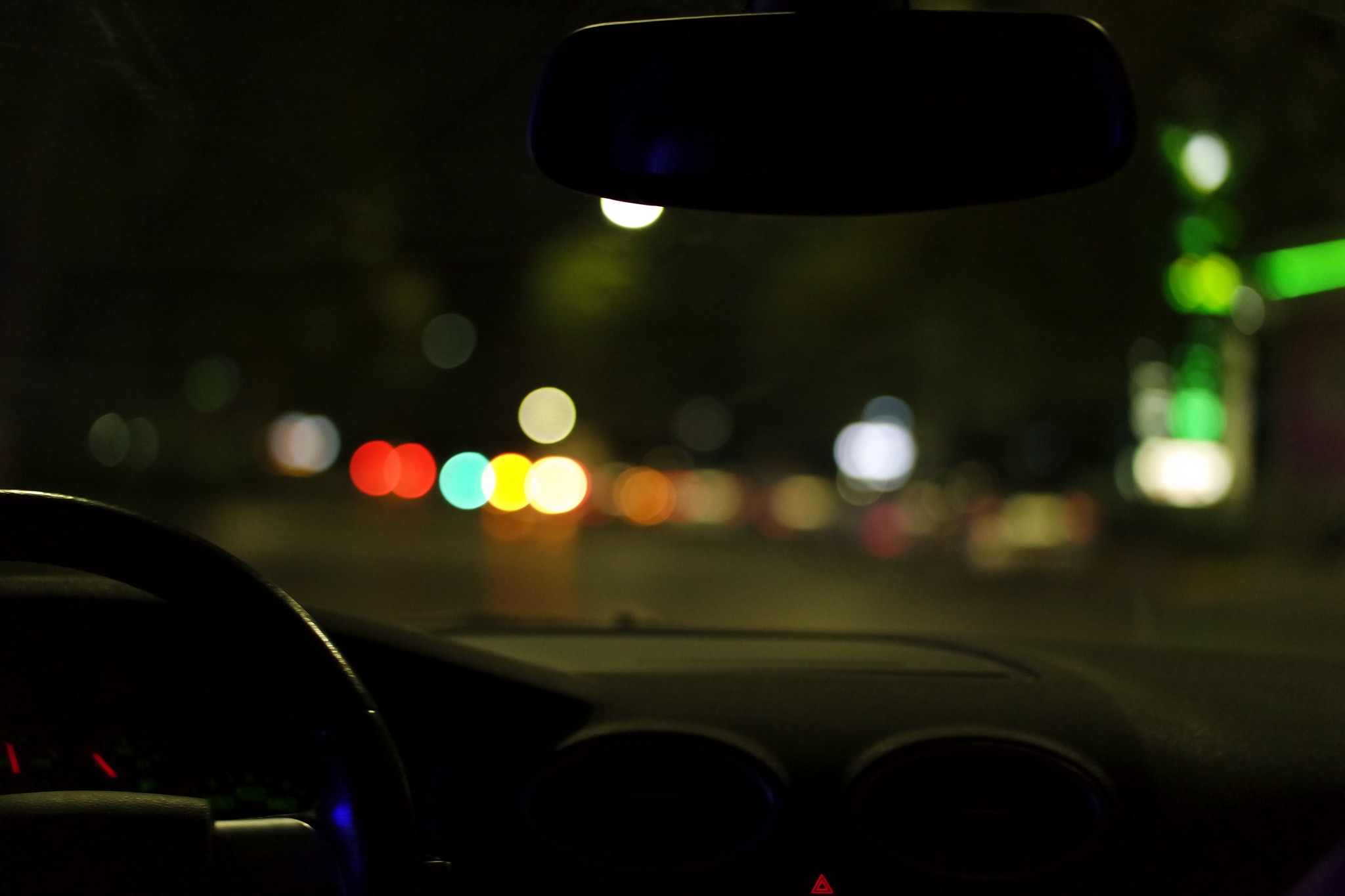 car window displaying orbs of light
