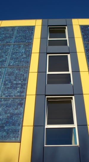 gray and yellow concrete building thumbnail