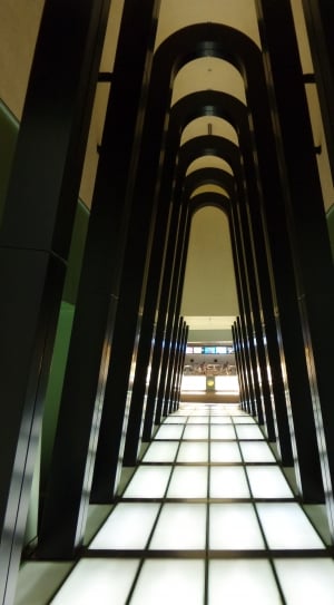 hallway with black concrete pillars thumbnail