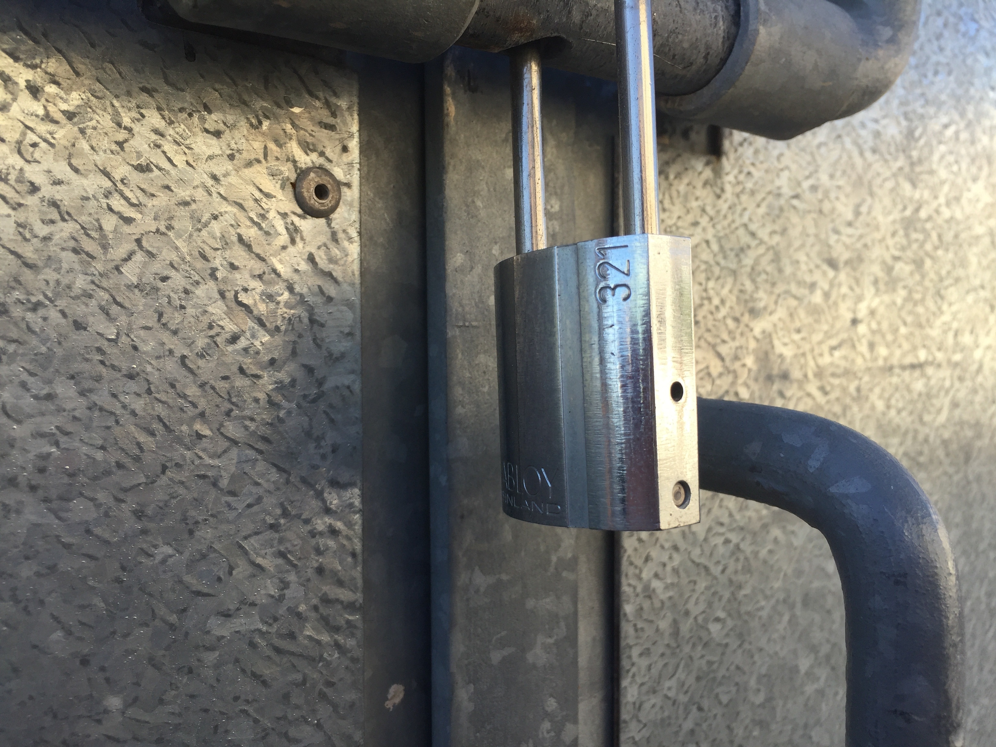grey metal padlock