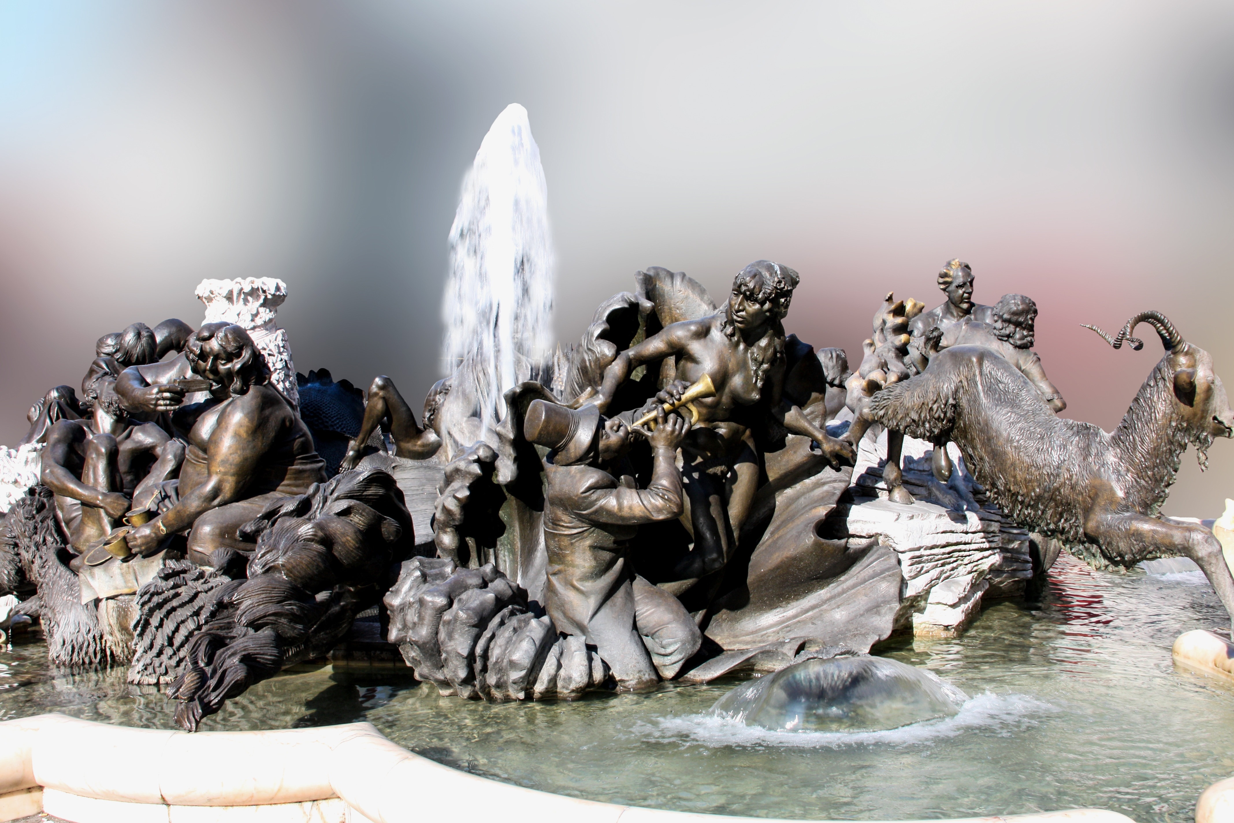 religious figurines in fountain decor