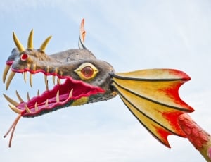 gray and red dragon head decoration thumbnail