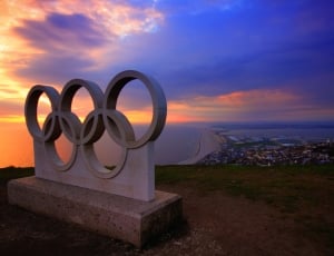 Olympics concrete logo statue on top of mountain thumbnail