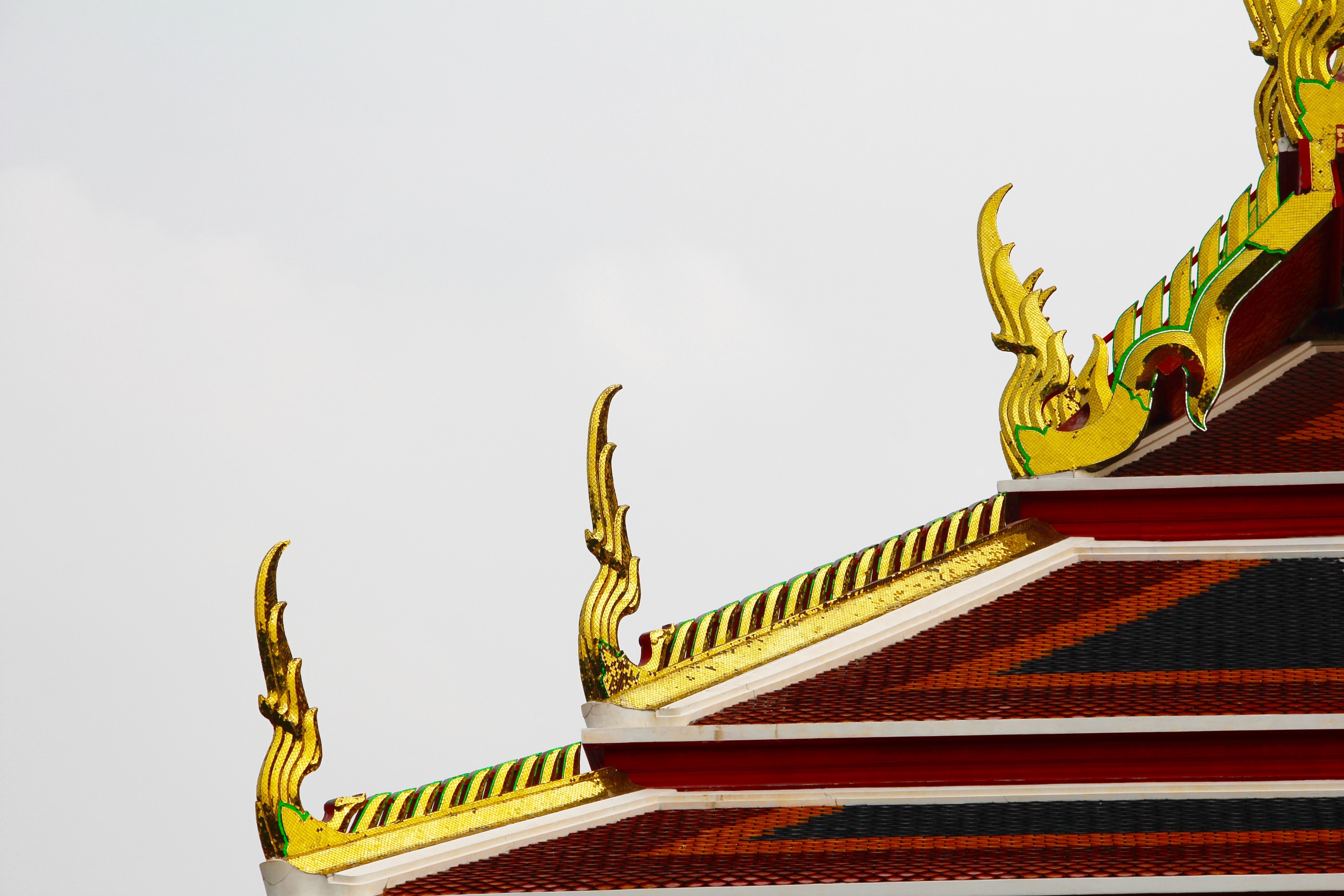 brass red and white pagoda roof