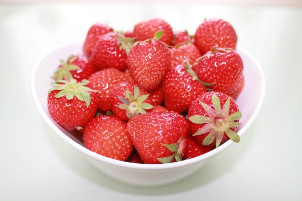 strawberries on white ceramic bowl preview
