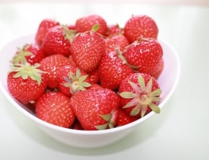 strawberries on white ceramic bowl thumbnail