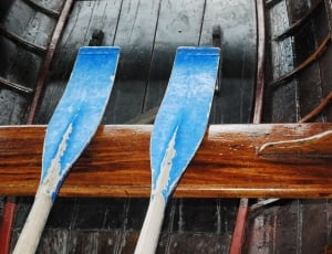 two blue boat oars thumbnail