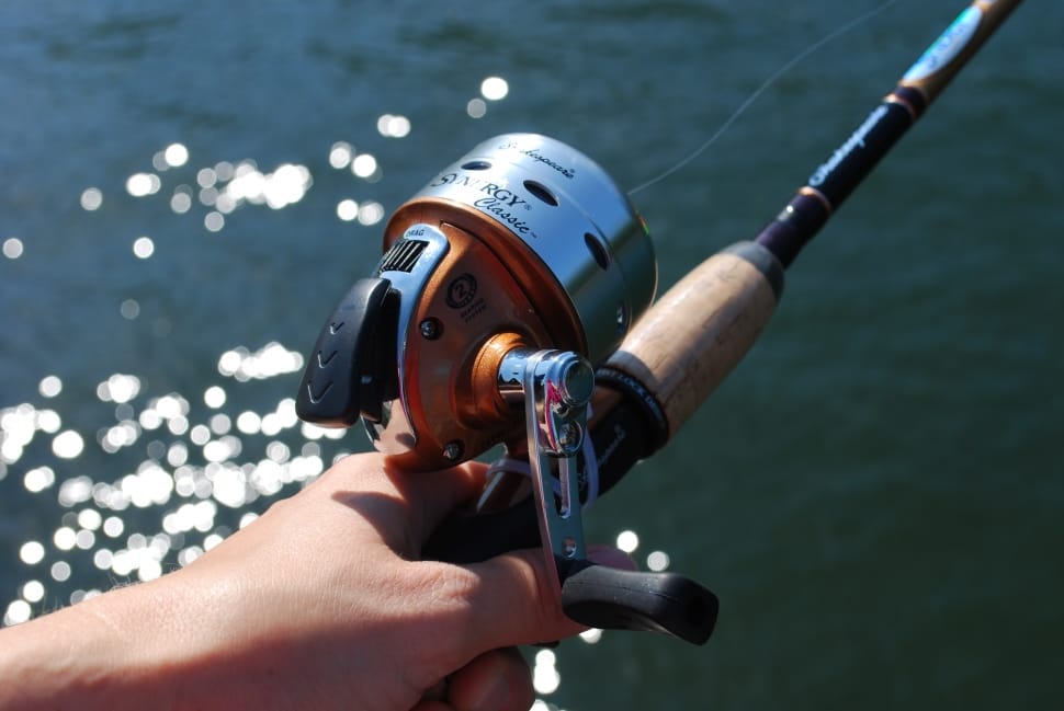 orange and grey fishing reel preview