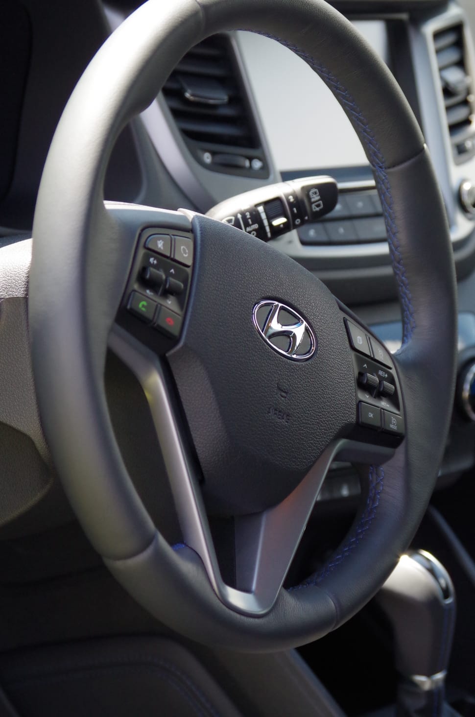 black hyundai multi functional steering wheel preview