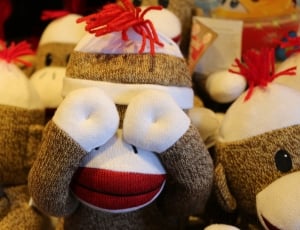 brown gray and red monkey plush toy thumbnail