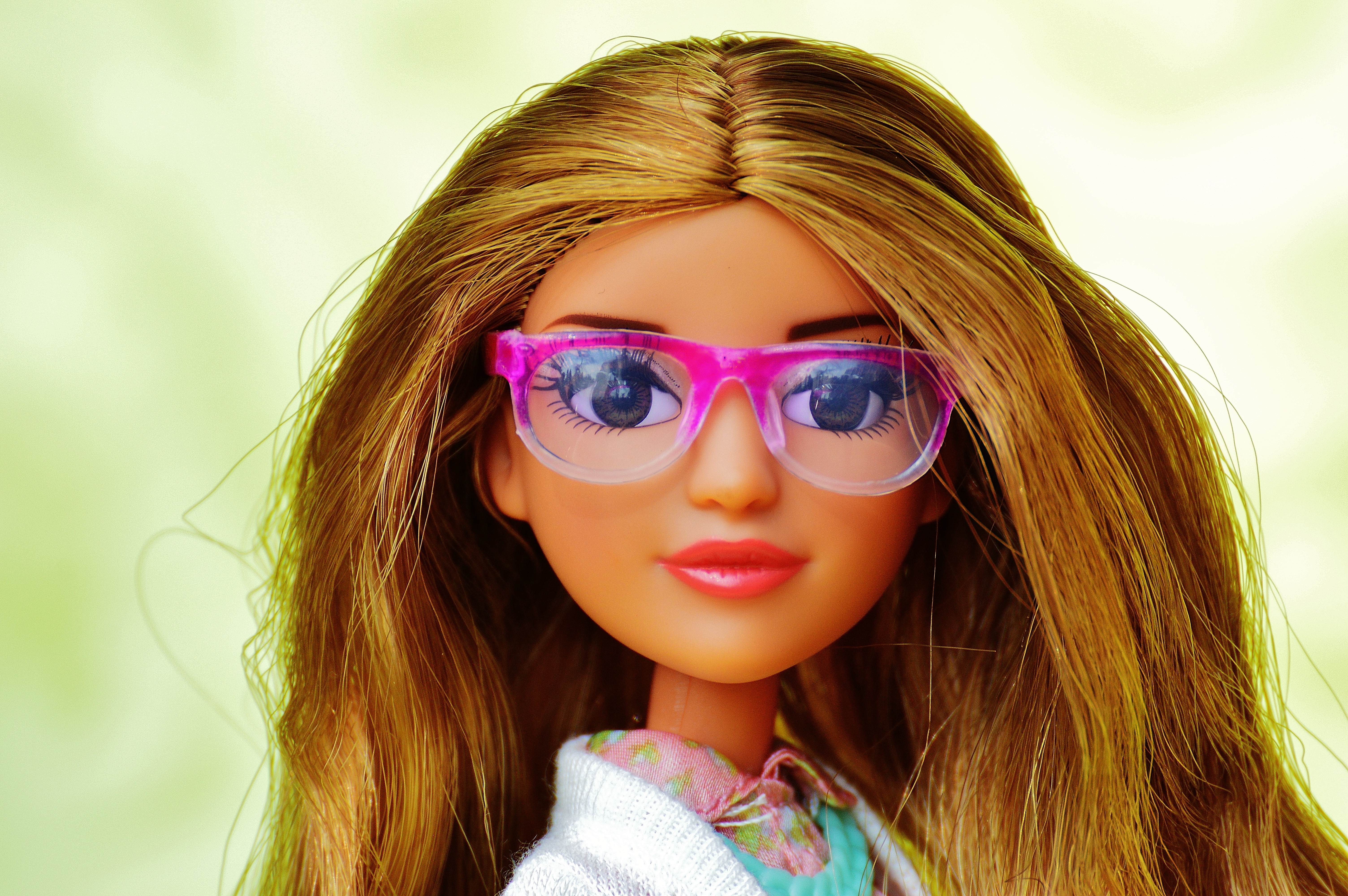 barbie in pink framed eyeglasses