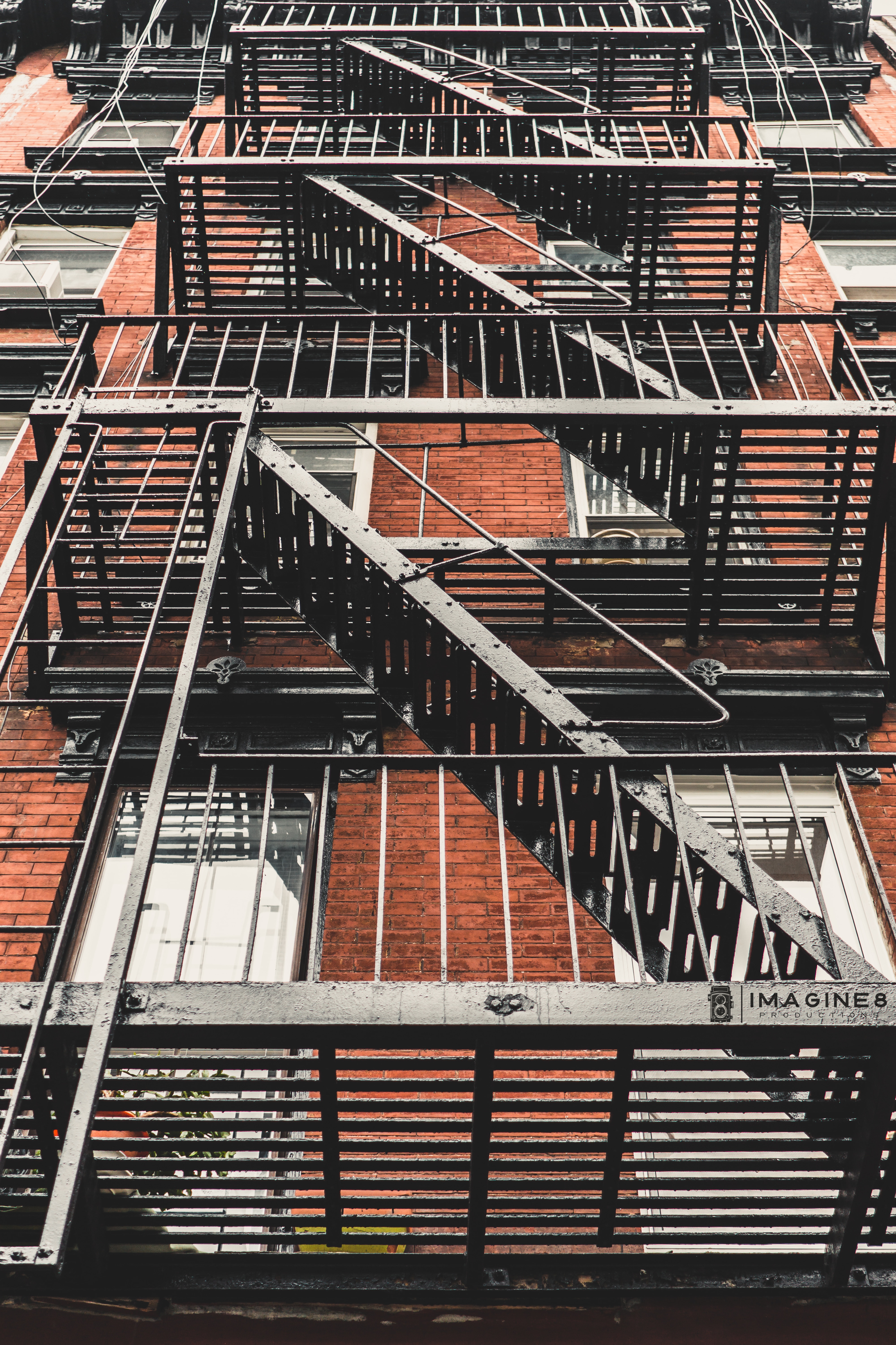 close photo of a black fire exit ladders