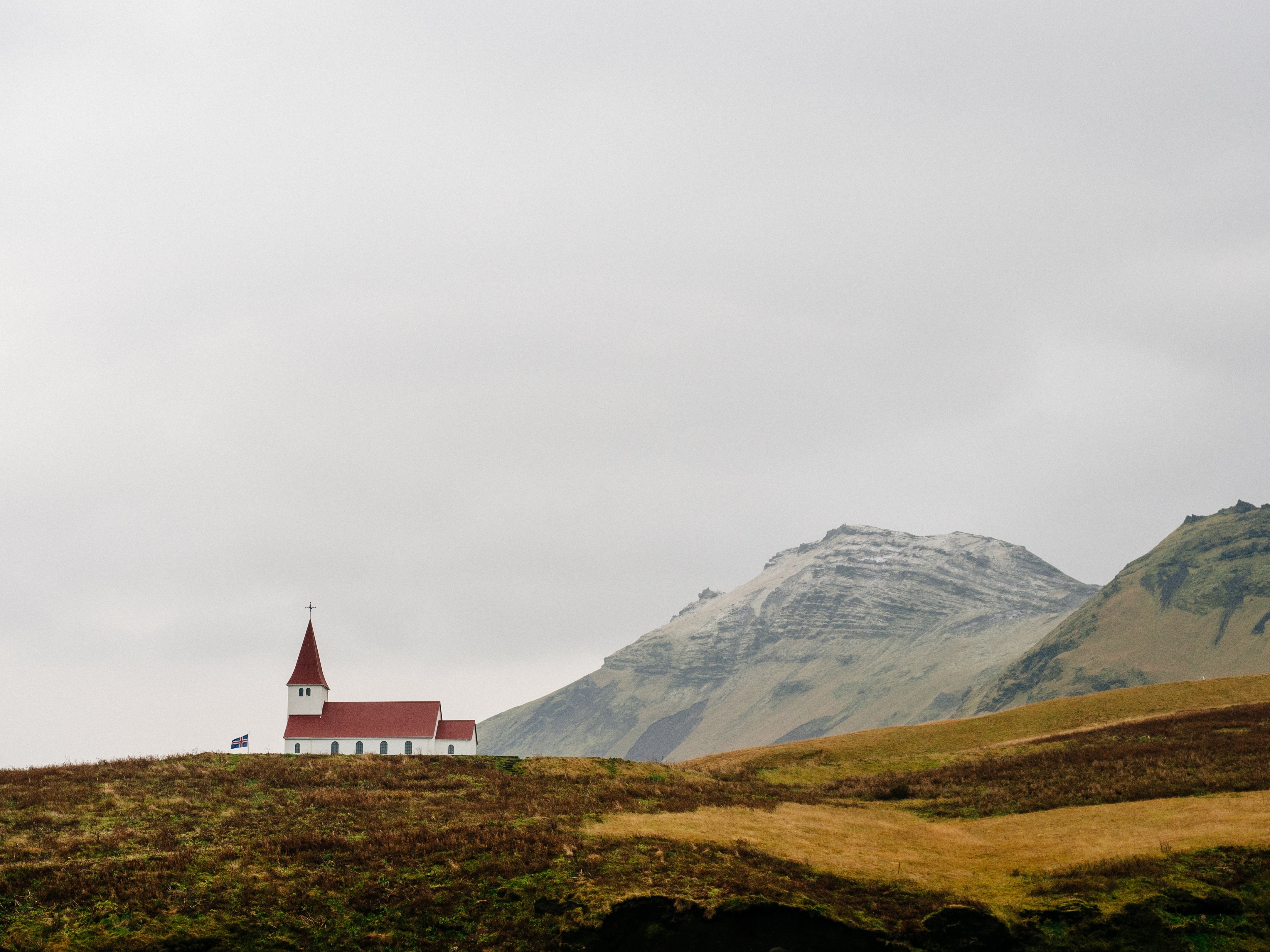 white and red concrete church