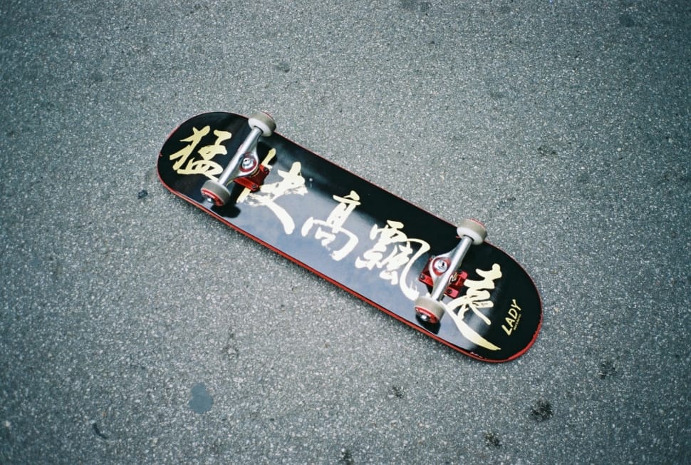 black and red kanji text lady skateboard preview