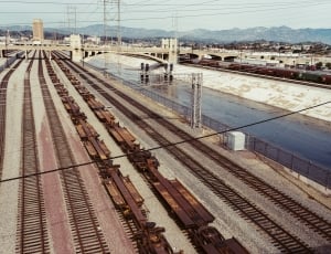 brown steel train railroads thumbnail