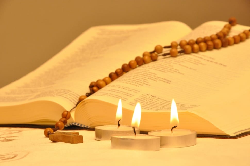 yellow rosary and 3 candles preview