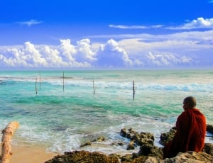 Theravada Buddhism, Monk Beside Beach, sea, sky thumbnail