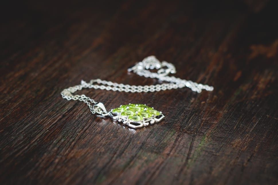 silver and green gemstone pendant necklace preview