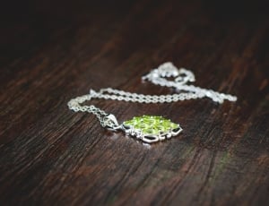 silver and green gemstone pendant necklace thumbnail