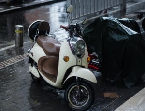 white and brown motor scooter thumbnail