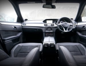grayscale photo of car interior thumbnail