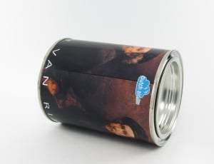 brown labeled can on white surface thumbnail