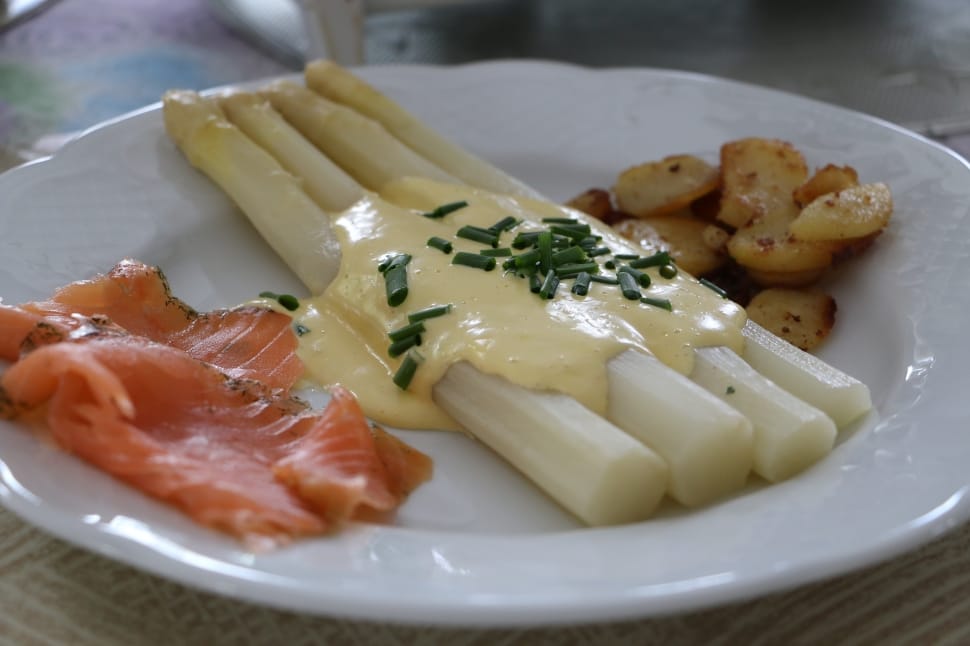 white asparagus and steamed salmon with sauteed garlic dish preview