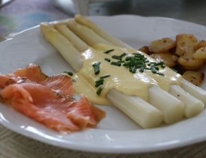white asparagus and steamed salmon with sauteed garlic dish thumbnail