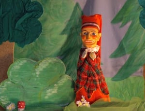 woman in red and green plaid puppet thumbnail