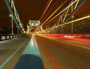 Timelapse photography on bridge during night time thumbnail