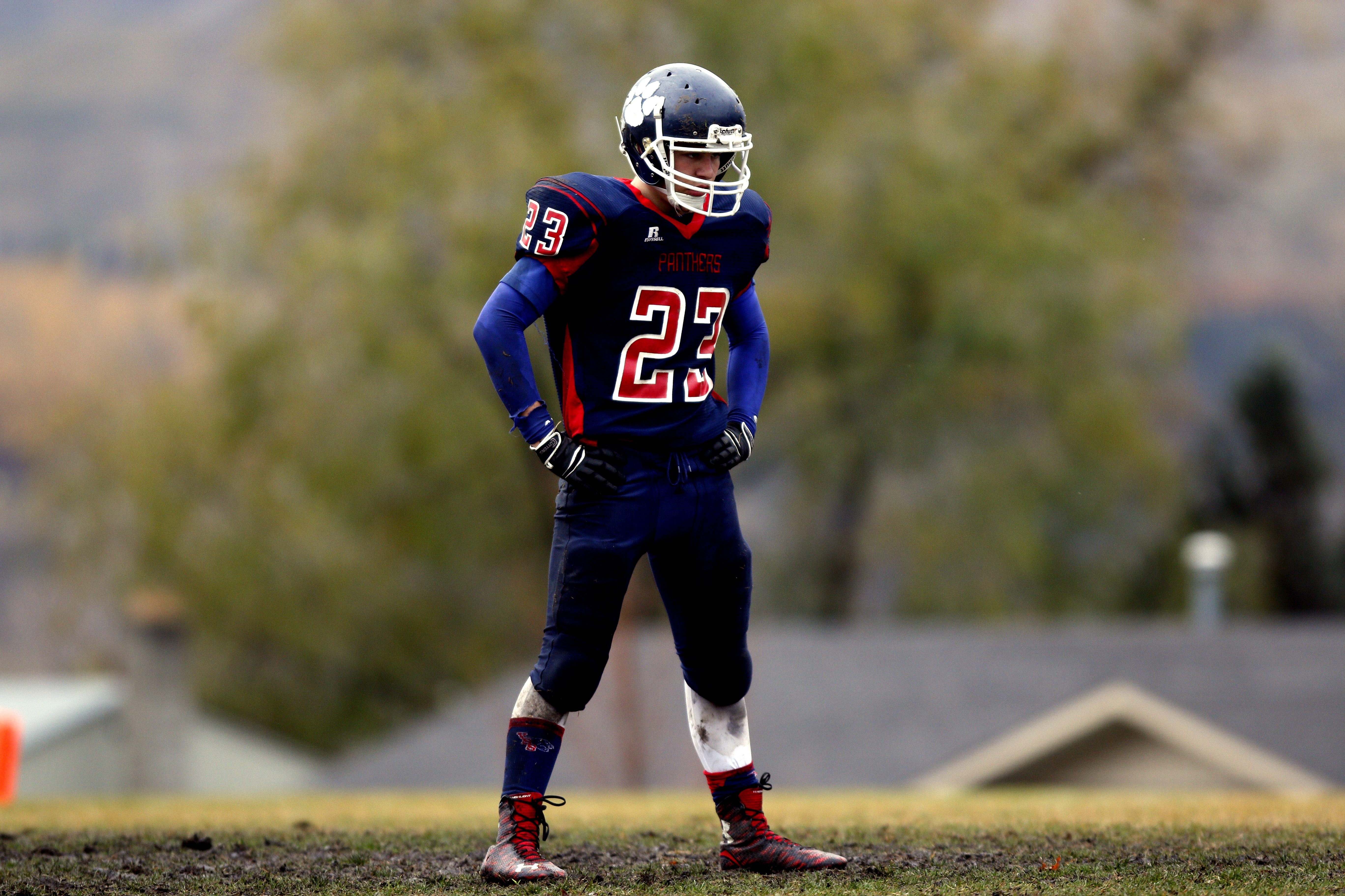 men's blue and red american football uniform