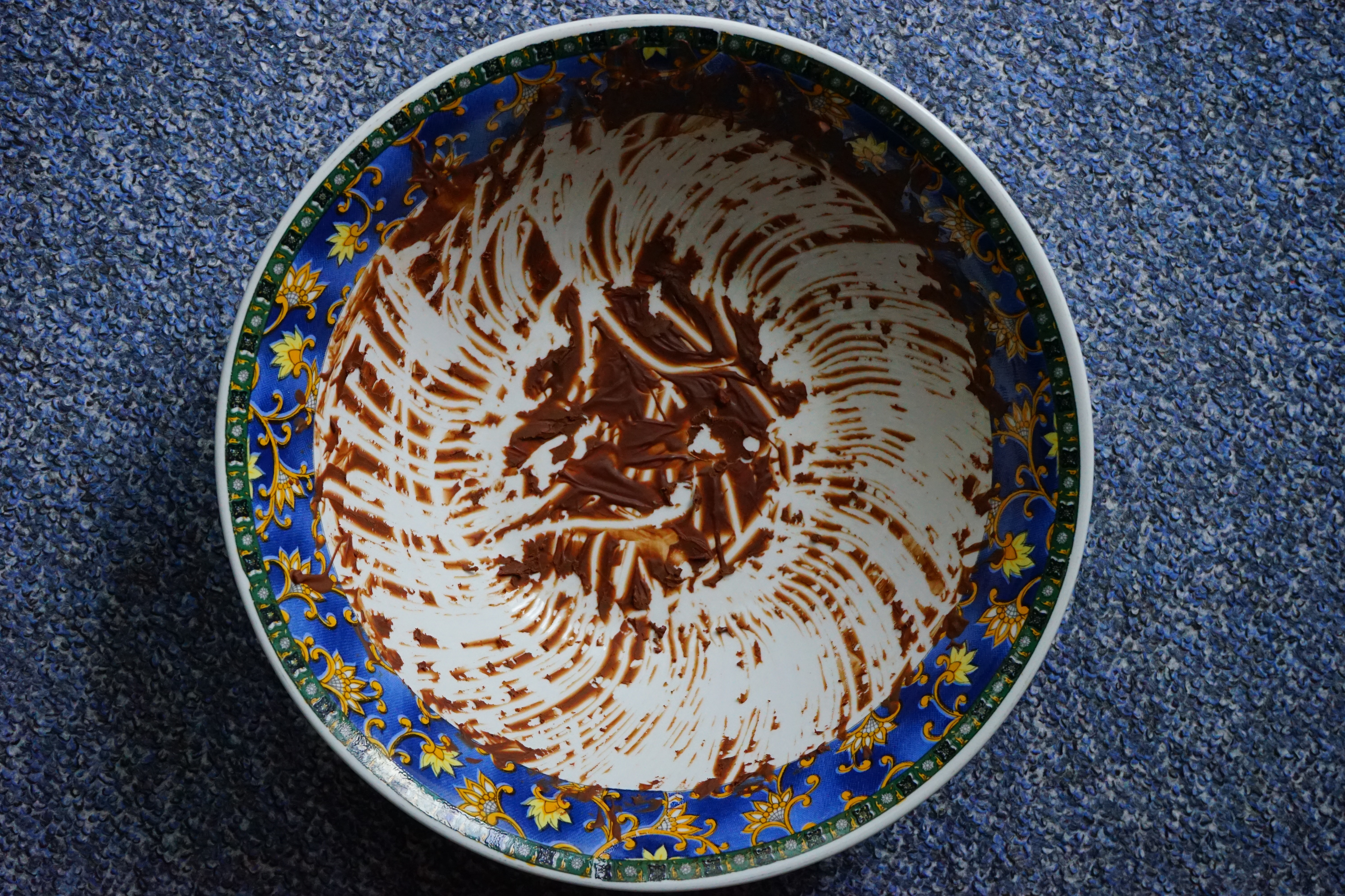 white blue and yellow ceramic decorative bowl