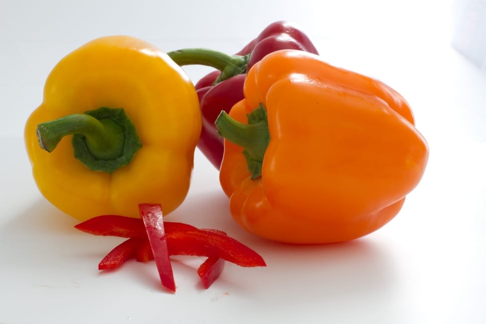 orange yellow and red bell pepper preview