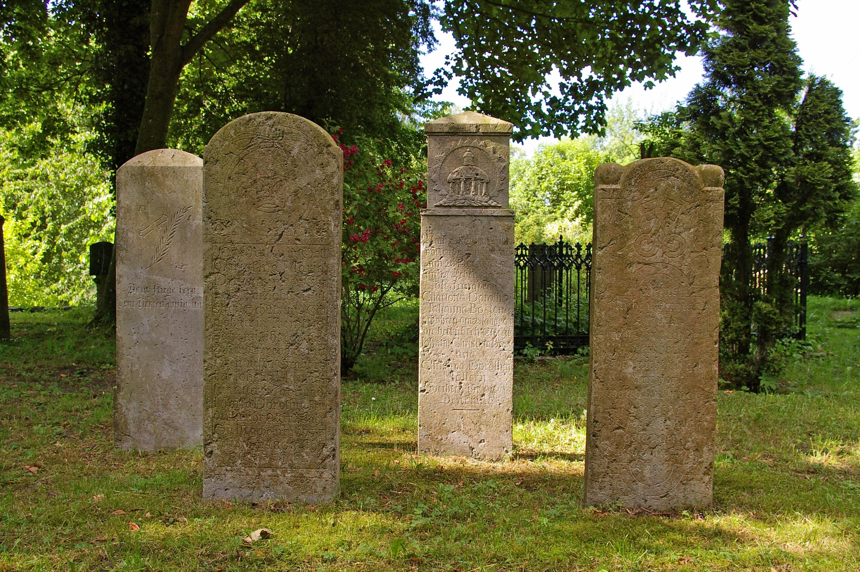 4 brown tombstones
