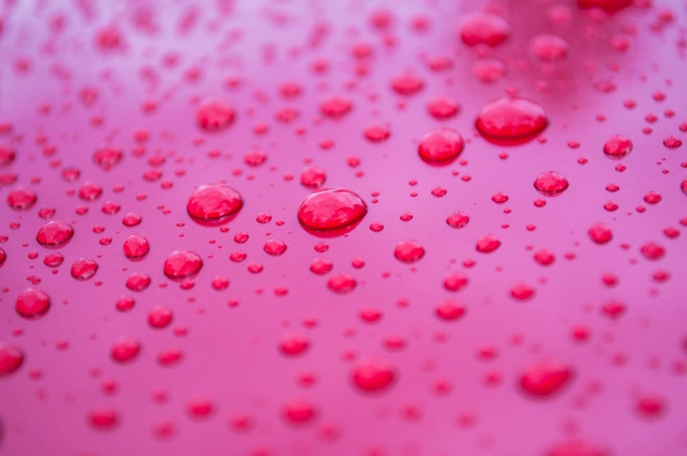 drops of water on red surface preview