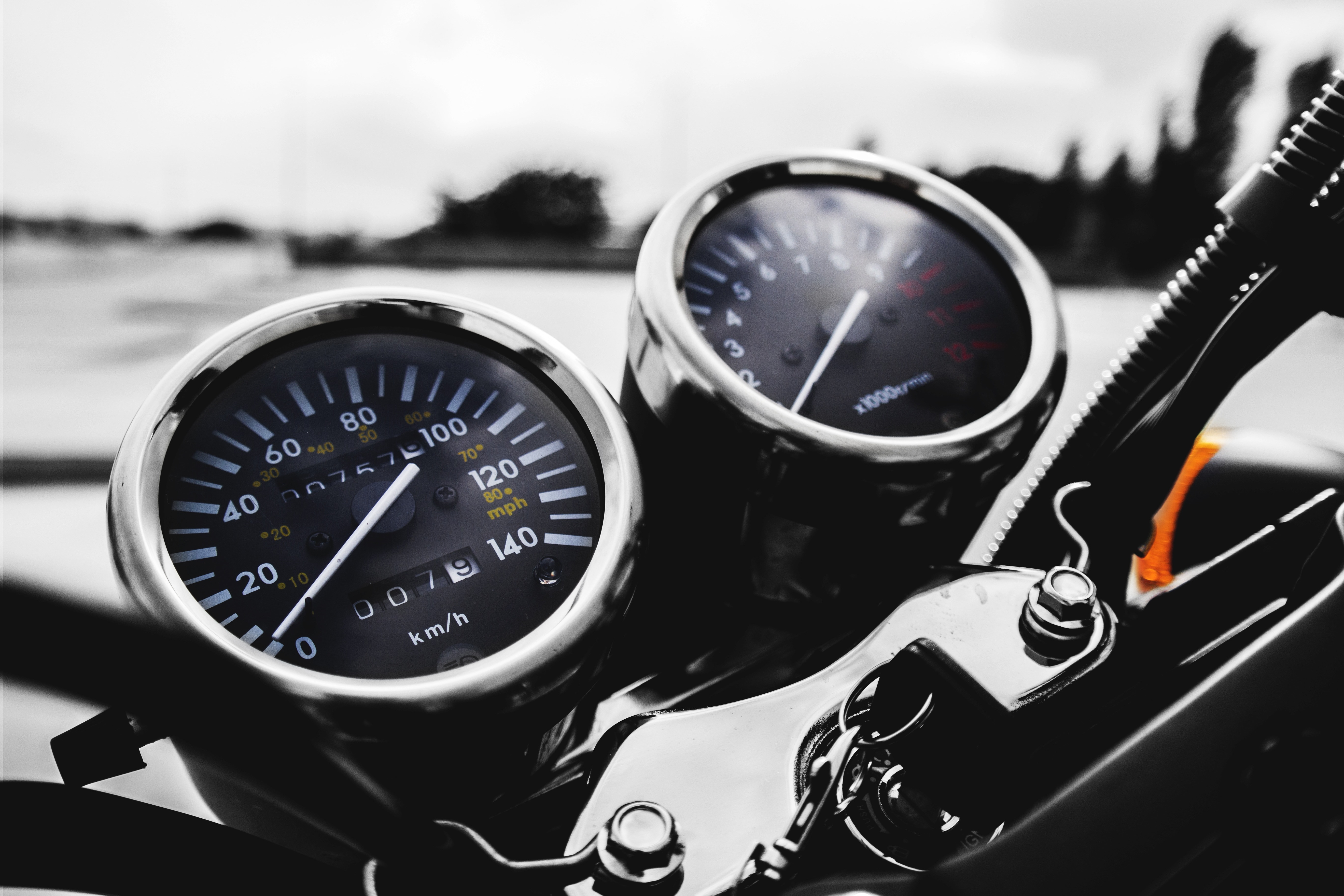 black and gray motorcycle speedometer