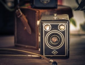 black and gray camera in table thumbnail