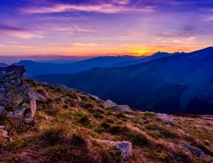 mountain silhouette during sunrise thumbnail