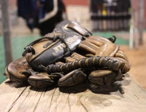 black and brown leather baseball mitt thumbnail