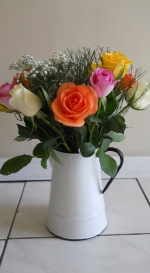 assorted flowers in white vasse thumbnail