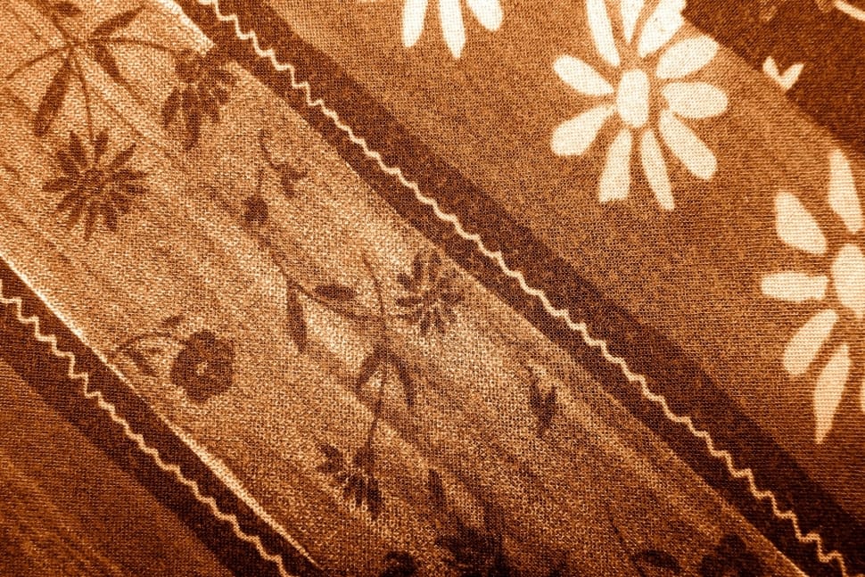 brown black and white floral textile preview