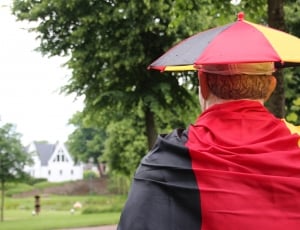 red black and yellow head umbrella thumbnail