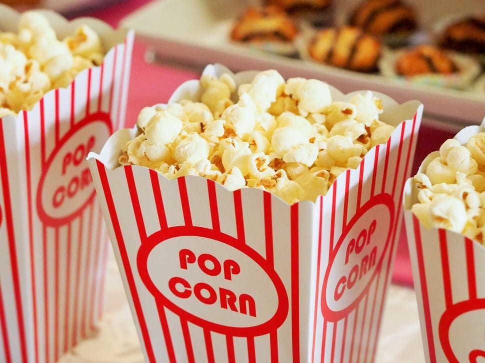 popcorn lot inside white and red pop corn box free image | Peakpx