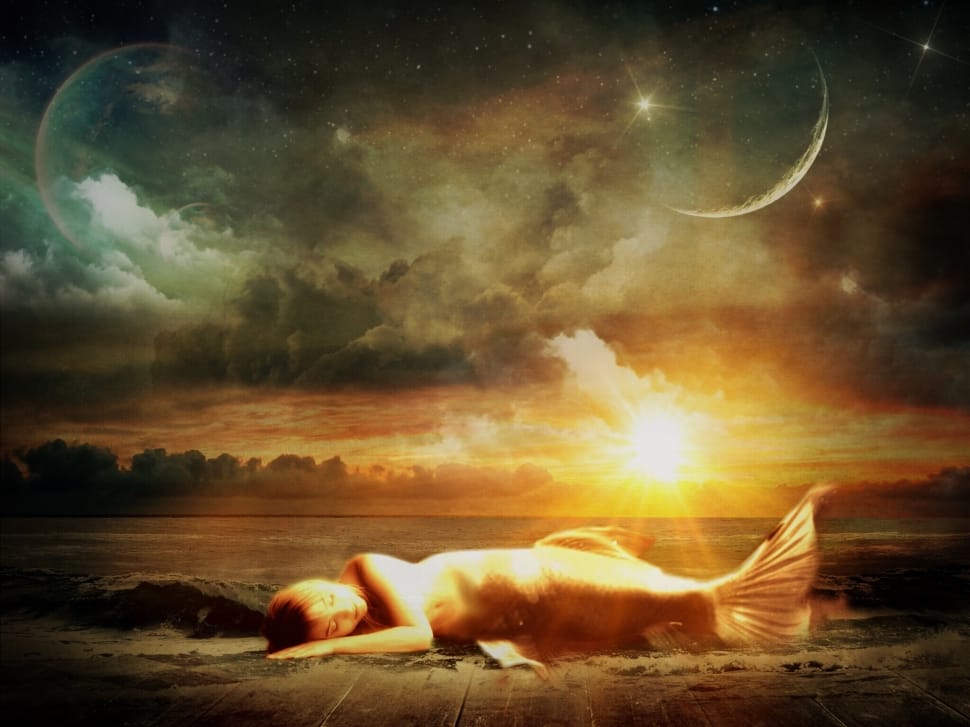 mermaid lying on the seashore during golden hour painting preview