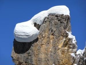 snow capped rock formation thumbnail