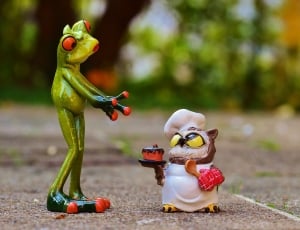 green frog and brown owl ceramic figurines thumbnail
