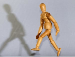 brown wooden action figure thumbnail