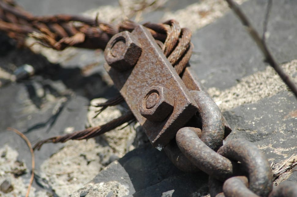 macro shot of gray steel  chain with bolt and stud preview